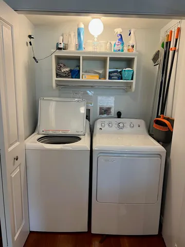 a view of a swimming pool with an outdoor seating