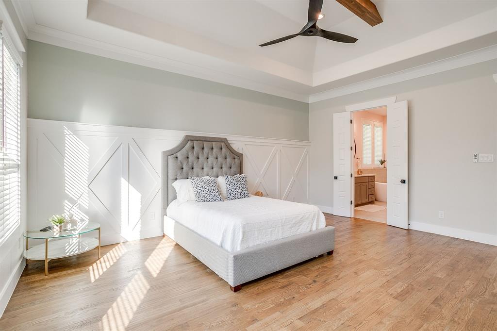 13921 Riviera East Fort Worth, TX 76028 - Photo 21 of 40 a bedroom with a bed and a window