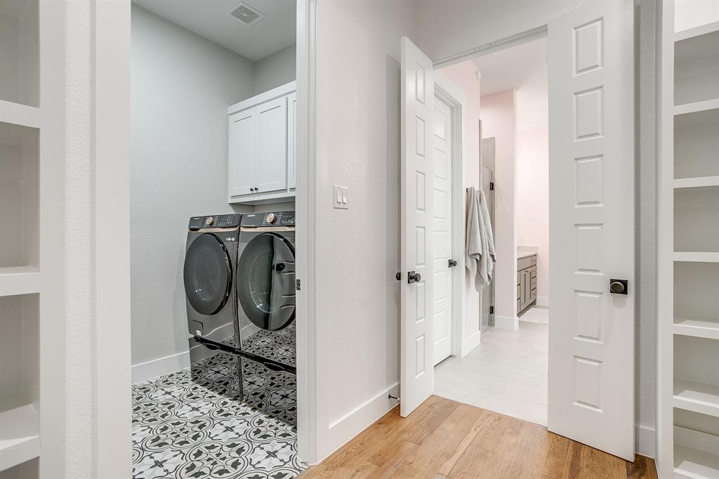 13921 Riviera East Fort Worth, TX 76028 - Photo 29 of 40 a view of a storage & utility room with wooden floor