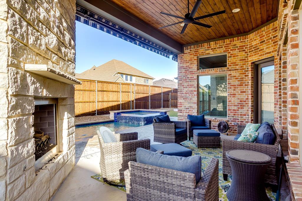 13921 Riviera East Fort Worth, TX 76028 - Photo 40 of 40 a outdoor space with patio the couches and a fireplace