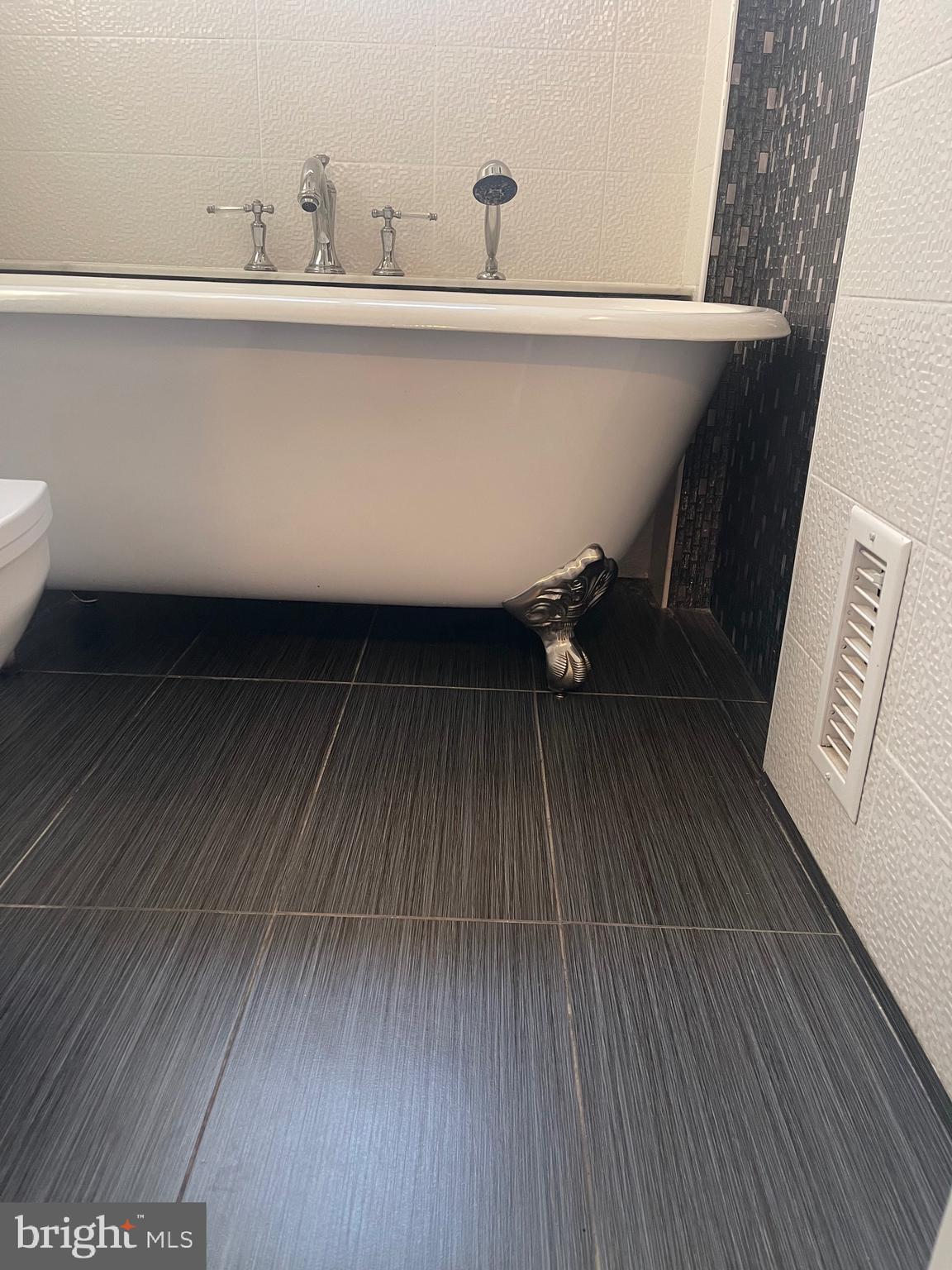 5528 Warwick Place Chevy Chase, MD 20815 - Photo 40 of 68 Iron Cast Soaking Tub