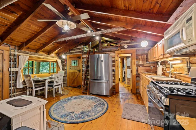 a kitchen with a stove and a refrigerator