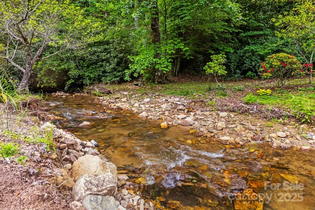a view of backyard with green space