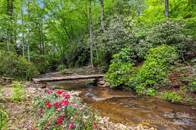 a view of a chairs and table in the patio