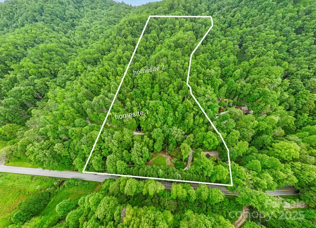 a view of a yard from a balcony