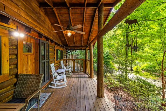 a view of a balcony with wooden floor