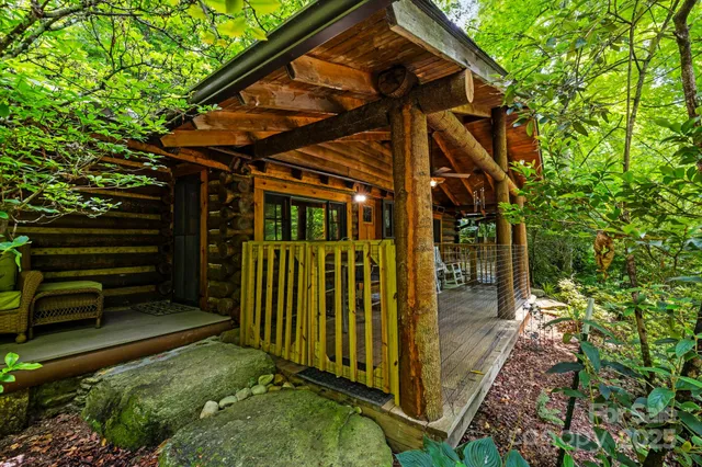 a view of outdoor space with deck and yard