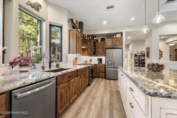 a room with furniture a book shelf and a book shelf