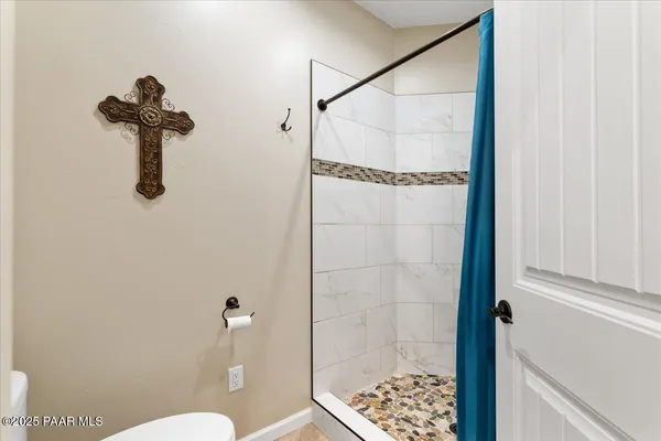 a bedroom with a bed and furniture