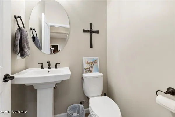 a utility room with sink dryer and washer