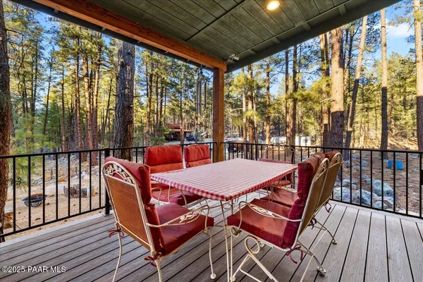 a view of a porch with wooden floor