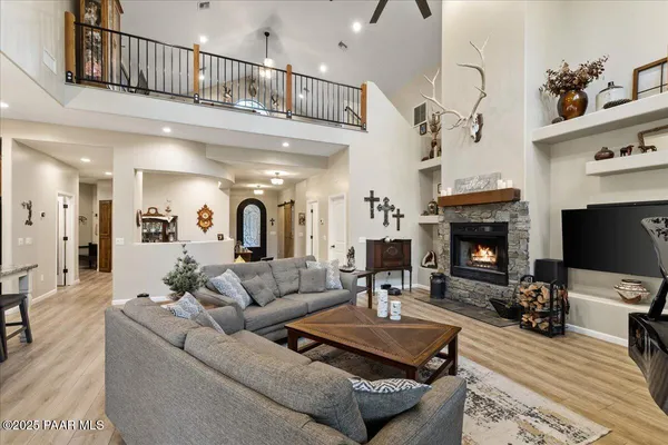 a view of living room and wooden floor