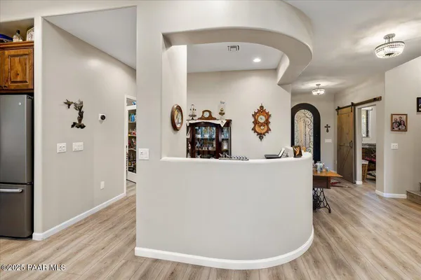 a kitchen with stainless steel appliances granite countertop a stove and cabinets