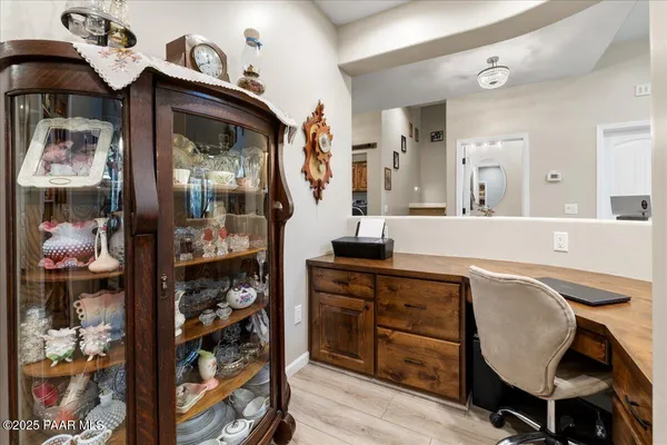 a kitchen with a sink cabinets and window
