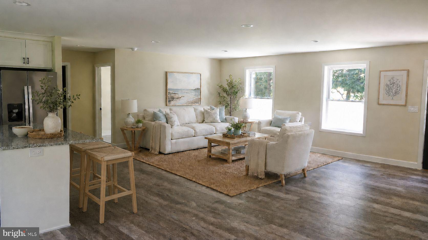 130 Soule Road New Bloomfield, PA 17068 - Photo 4 of 18 a living room with furniture a wooden floor and a large window