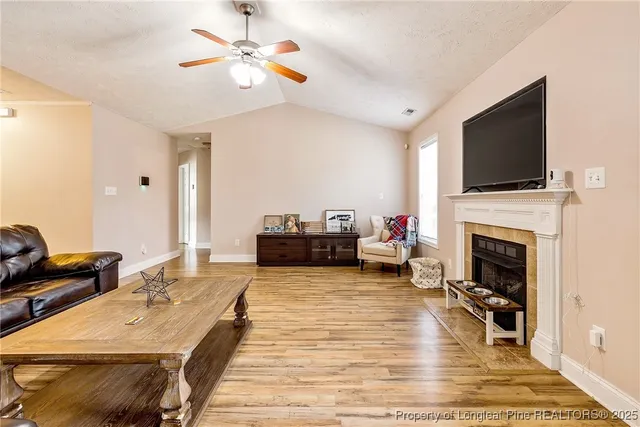 a living room with furniture or fireplace and a flat screen tv