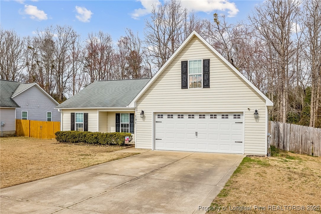 191 Quarry Lane Raeford, NC 28376 - Photo 2 of 28 a view of backyard of house garage