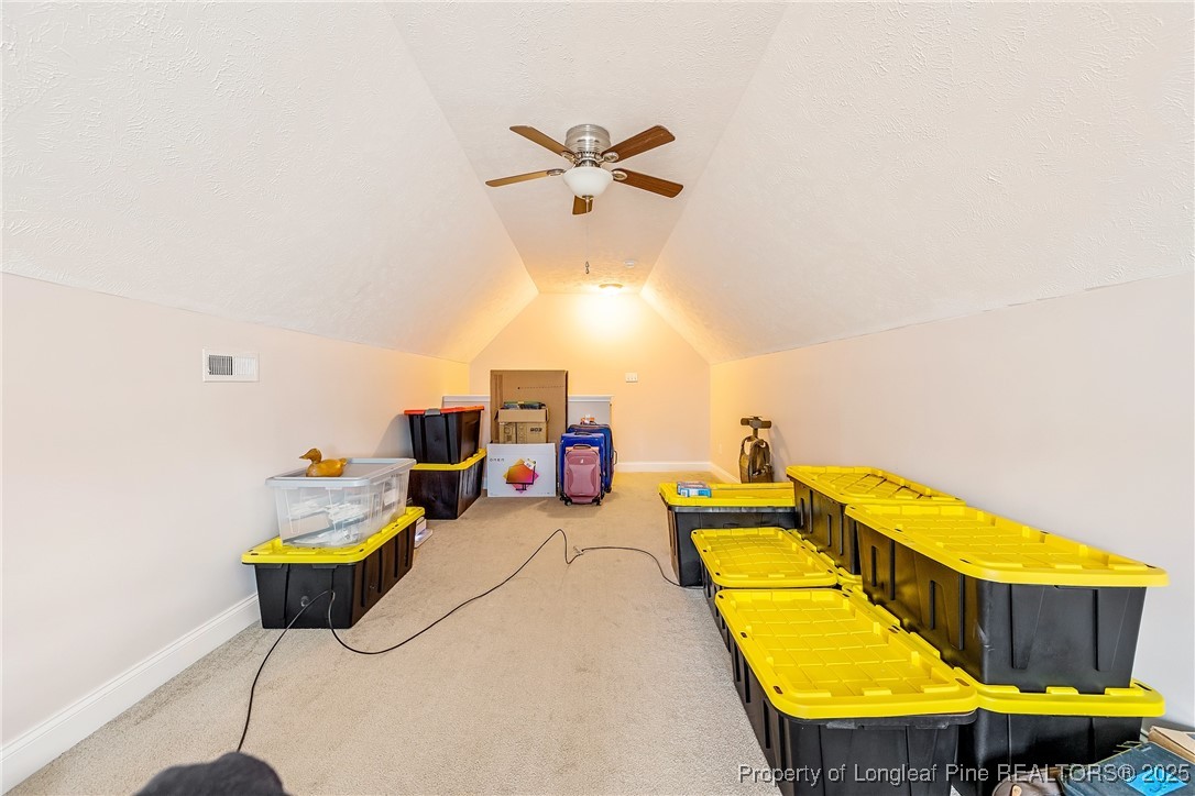 191 Quarry Lane Raeford, NC 28376 - Photo 21 of 28 a room with gym equipment