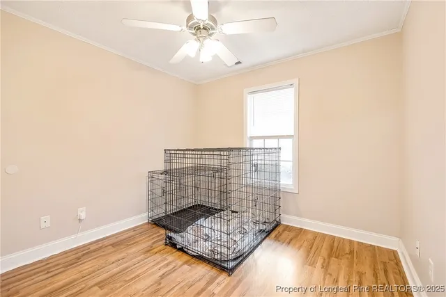 a view of wooden floor with a window