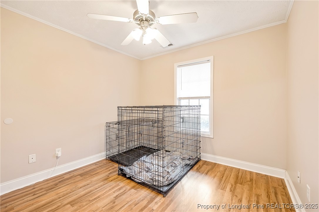 191 Quarry Lane Raeford, NC 28376 - Photo 23 of 28 a view of wooden floor with a window