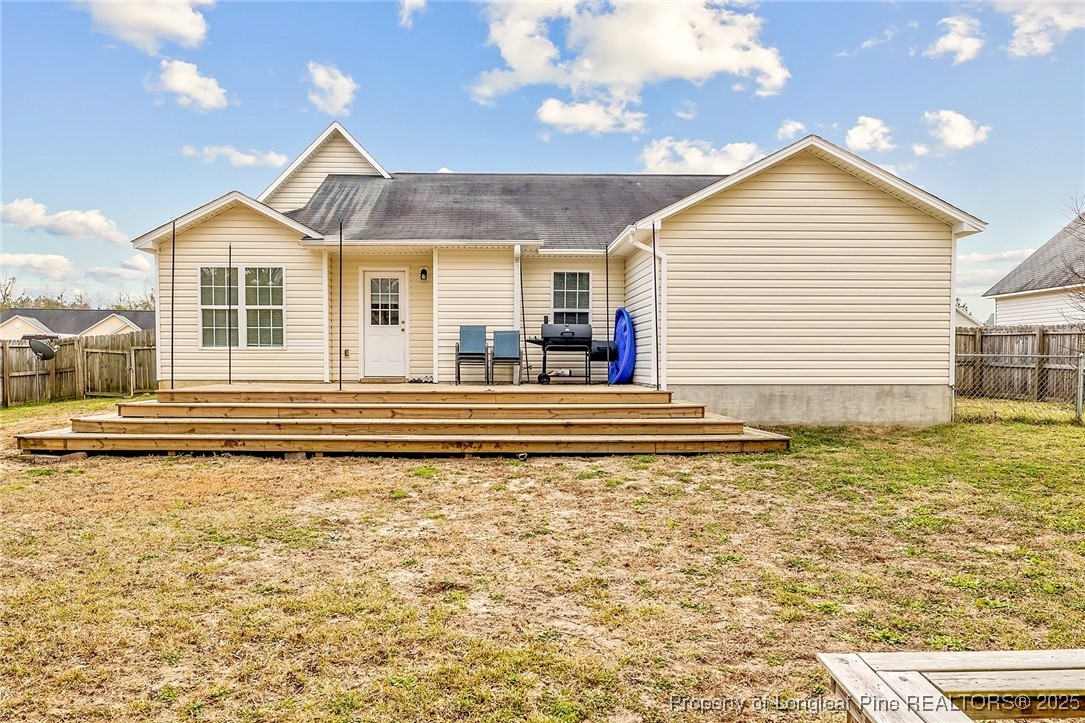 191 Quarry Lane Raeford, NC 28376 - Photo 4 of 28 a front view of a house with a yard