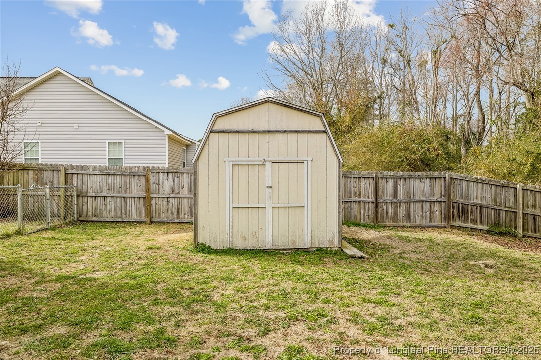 191 Quarry Lane Raeford, NC 28376 - Photo 7 of 28 a view of a backyard