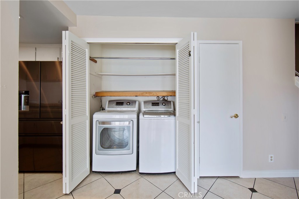 1381 South Walnut Street, Unit 2008 Anaheim, CA 92802 - Photo 15 of 40 a utility room with washer and dryer