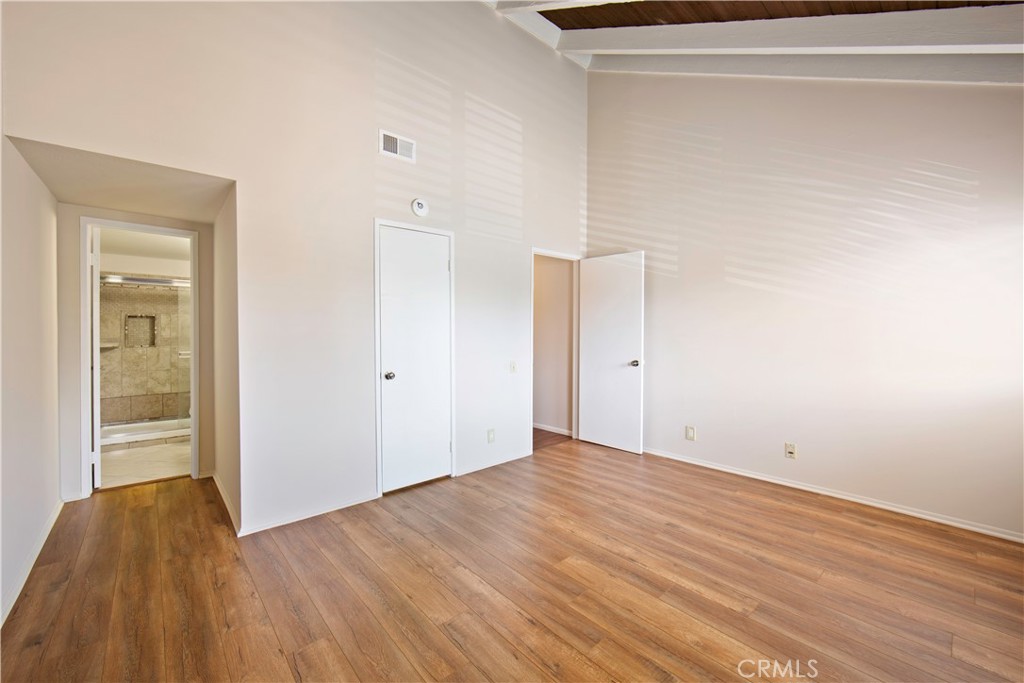 1381 South Walnut Street, Unit 2008 Anaheim, CA 92802 - Photo 22 of 40 a view of an empty room with wooden floor