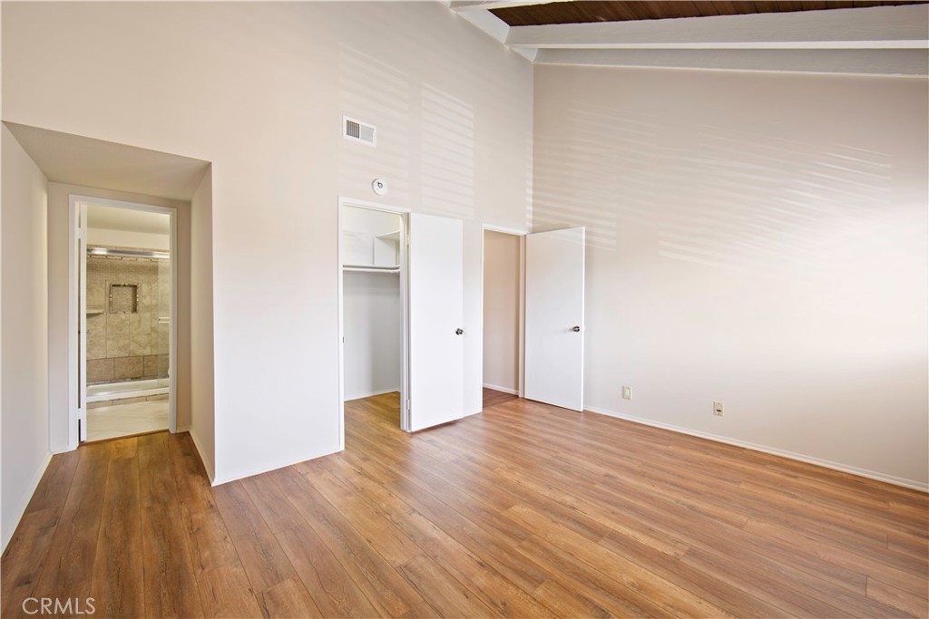 1381 South Walnut Street, Unit 2008 Anaheim, CA 92802 - Photo 23 of 40 a view of an empty room with wooden floor