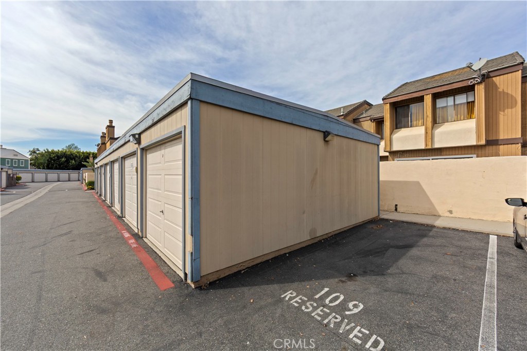 1381 South Walnut Street, Unit 2008 Anaheim, CA 92802 - Photo 35 of 40 a view of a house with wooden fence