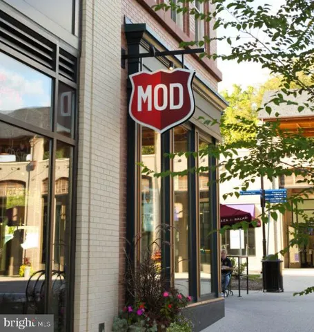 a childrens park with lots of swings and slides