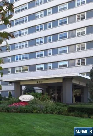 a front view of building with an outdoor space