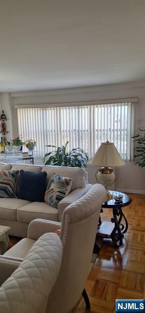 280 Prospect, Unit 9H Hackensack, NJ 07601 - Photo 12 of 38 a living room with furniture and a large window