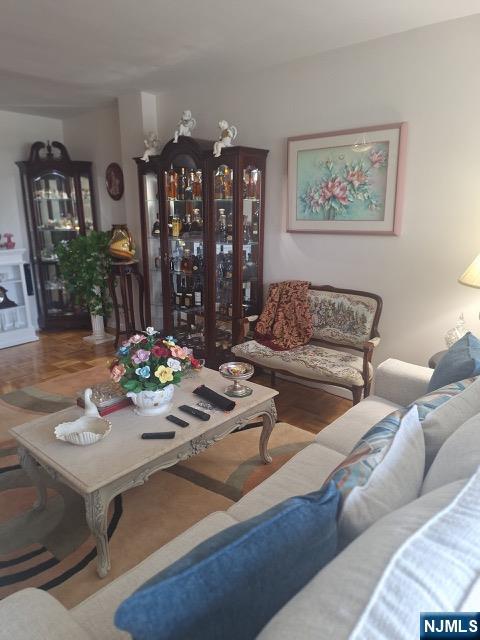 280 Prospect, Unit 9H Hackensack, NJ 07601 - Photo 16 of 38 a living room with furniture kitchen and a table