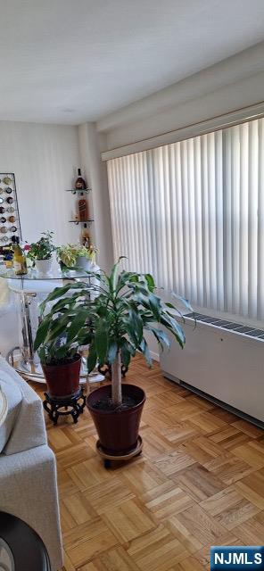 280 Prospect, Unit 9H Hackensack, NJ 07601 - Photo 17 of 38 a potted plant sitting on top of a wooden floor