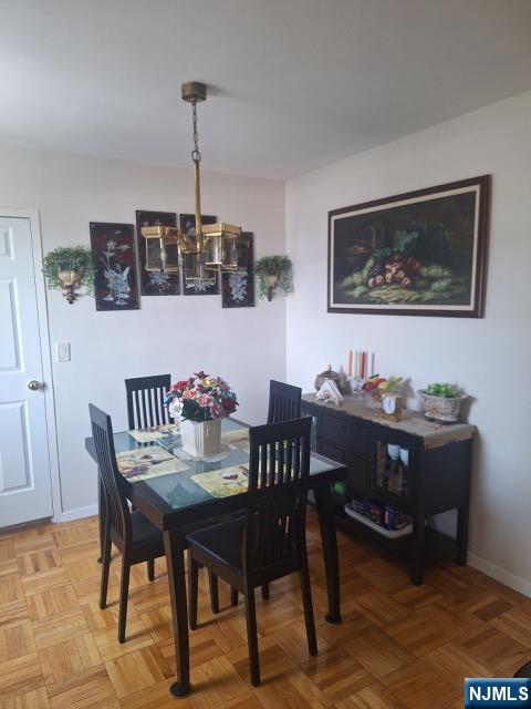 280 Prospect, Unit 9H Hackensack, NJ 07601 - Photo 20 of 38 a view of a dining room with furniture