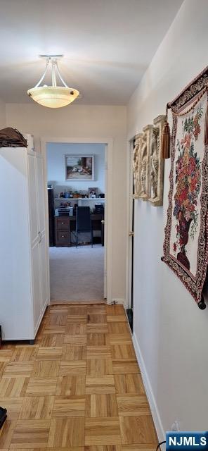 280 Prospect, Unit 9H Hackensack, NJ 07601 - Photo 21 of 38 a view of a hallway to rooms and stairs