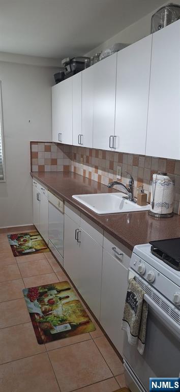 280 Prospect, Unit 9H Hackensack, NJ 07601 - Photo 23 of 38 a kitchen with a sink and cabinets
