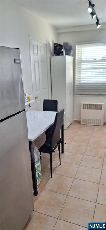 280 Prospect, Unit 9H Hackensack, NJ 07601 - Photo 24 of 38 a view of a dining room with furniture