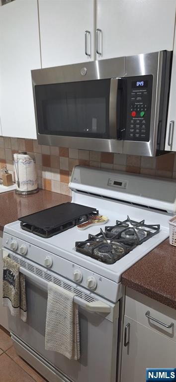 280 Prospect, Unit 9H Hackensack, NJ 07601 - Photo 26 of 38 a close view of stove top oven