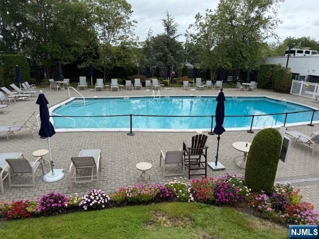 280 Prospect, Unit 9H Hackensack, NJ 07601 - Photo 32 of 38 a view of backyard with seating space and trees