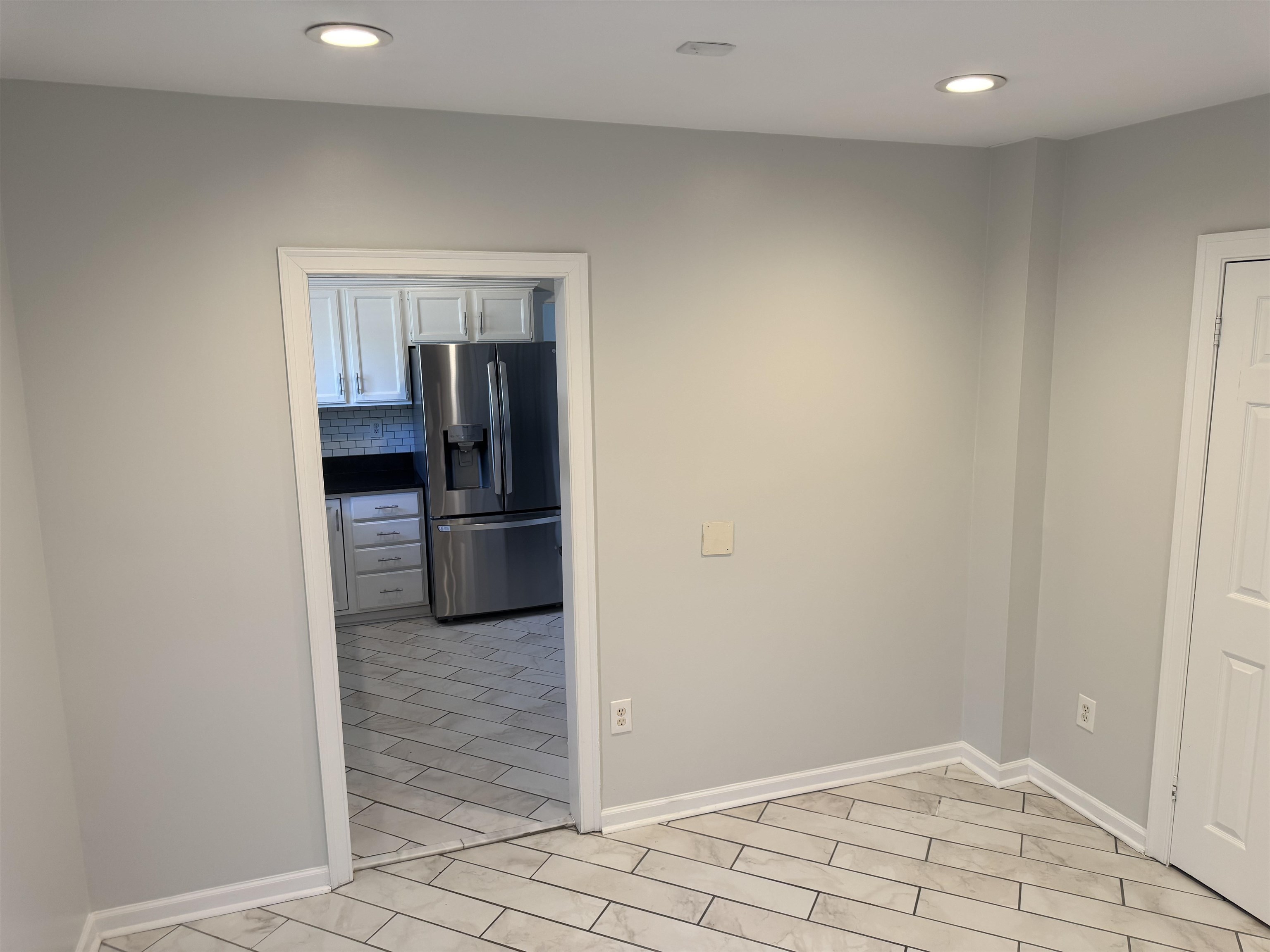 193 Alexander Street Memphis, TN 38111 - Photo 12 of 25 a view of a kitchen from the hallway