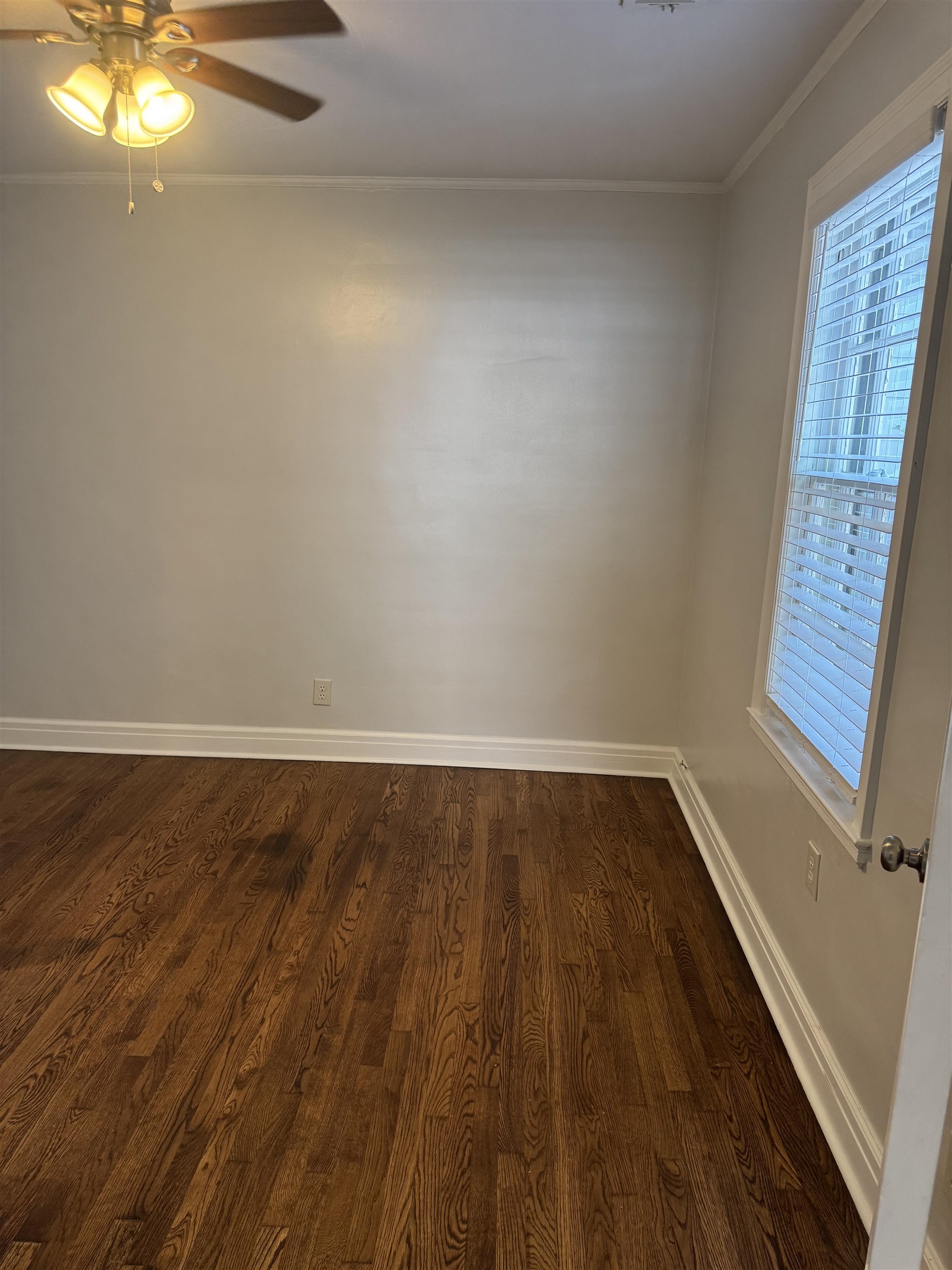 193 Alexander Street Memphis, TN 38111 - Photo 14 of 25 a view of a room with wooden floor and fan