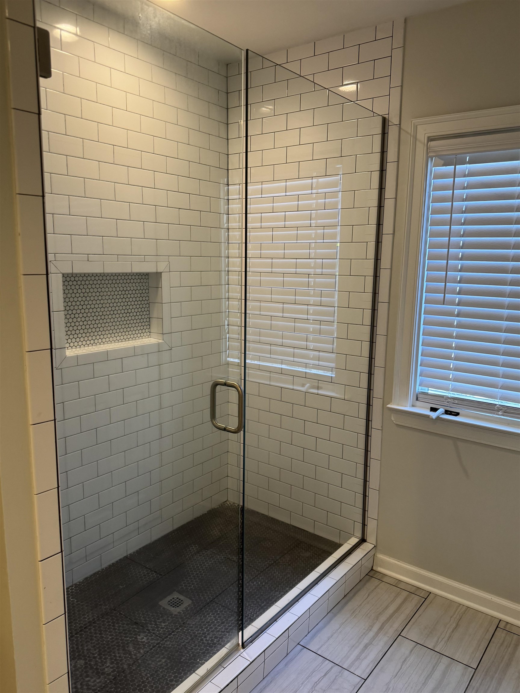 193 Alexander Street Memphis, TN 38111 - Photo 23 of 25 a bathroom with a shower