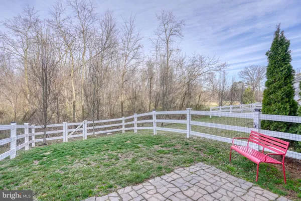 a view of outdoor space with deck and yard