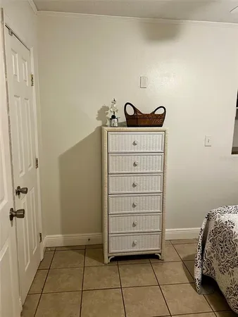 a view of bedroom with cabinets