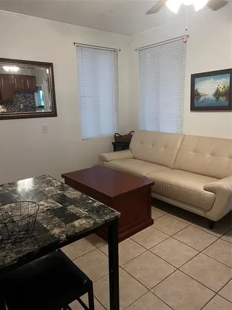 a living room with furniture and a couch