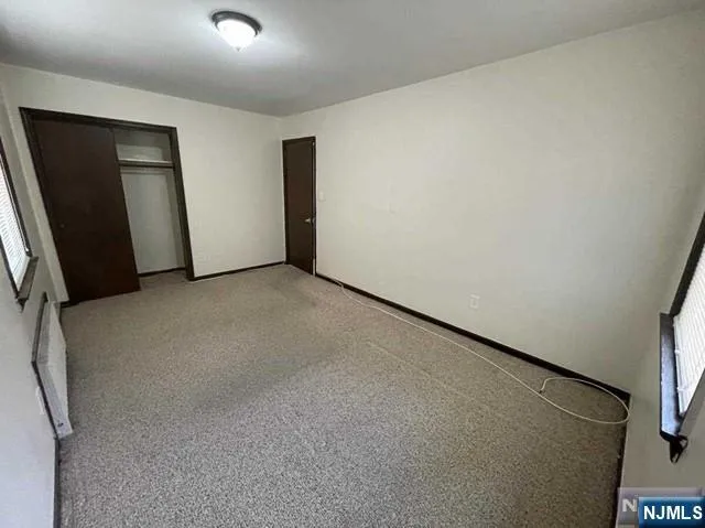 an empty room with closet