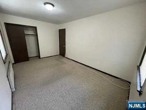 an empty room with closet