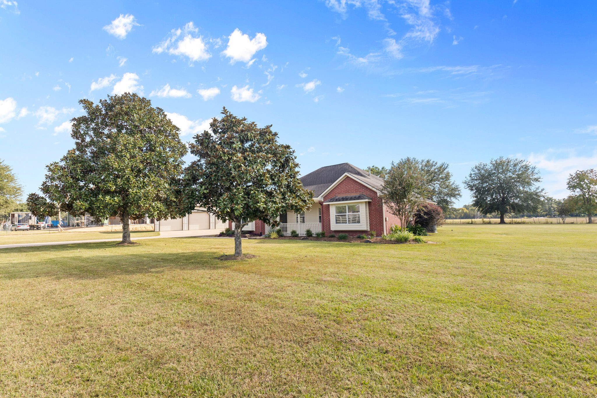 24236 Stuebner Airline Road Tomball, TX 77375 - Photo 2 of 39 View of the home as you come up the private drive.